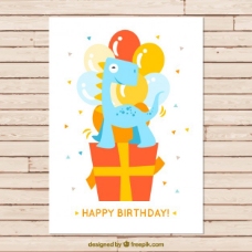 生日礼物漂亮的恐龙在一个礼物生日卡片