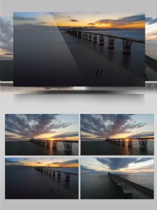 实拍大海面上桥梁美丽夕阳视频素材