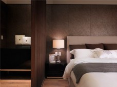 现代雅致卧室深褐色背景墙室内装修效果图