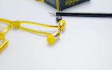 拉链耳机 耳机 黄色 摄影 J图片